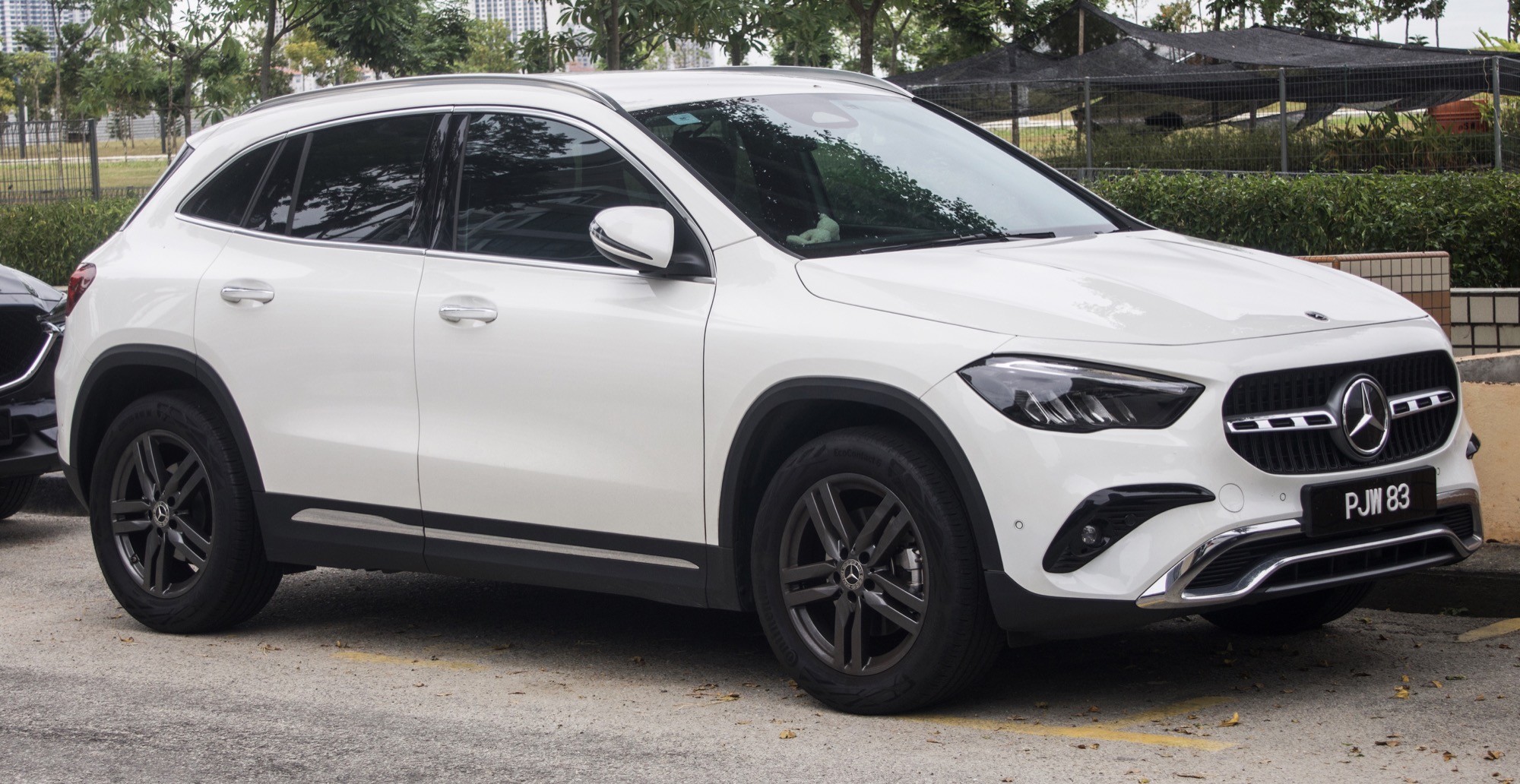 White 2024 Mercedes-Benz GLA compact SUV parked outdoors